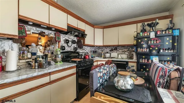 a bed room with a bed mirror and a window