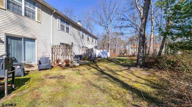 a view of swimming pool with outdoor seating