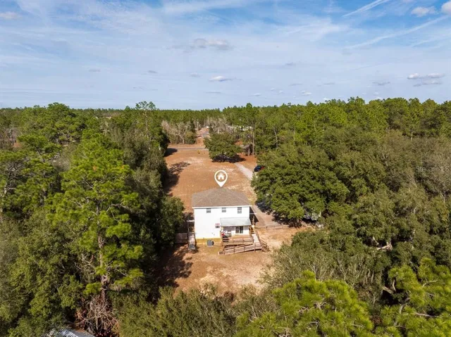 a view of a city with tall buildings in the background