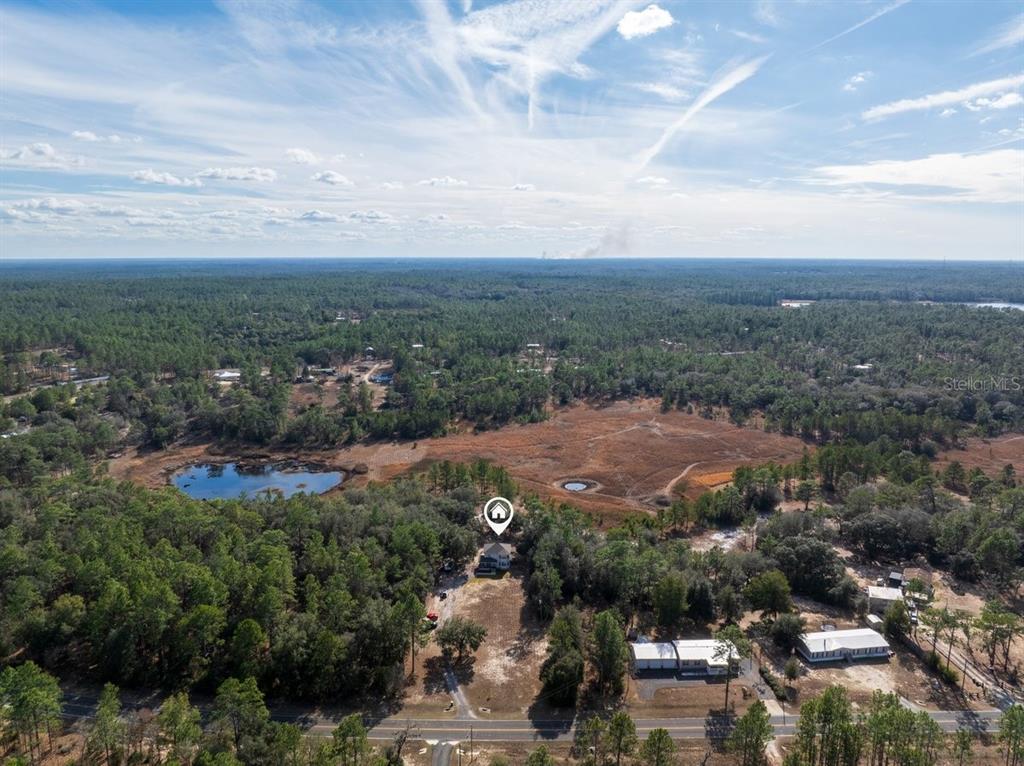 240 Whirlwind Loop Hawthorne, FL 32640 - Photo 34 of 39 a view of a city