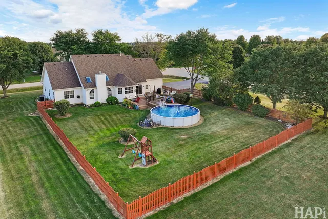 a view of a garden with a barn in it
