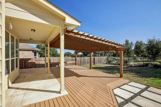 a backyard of a house with lots of green space
