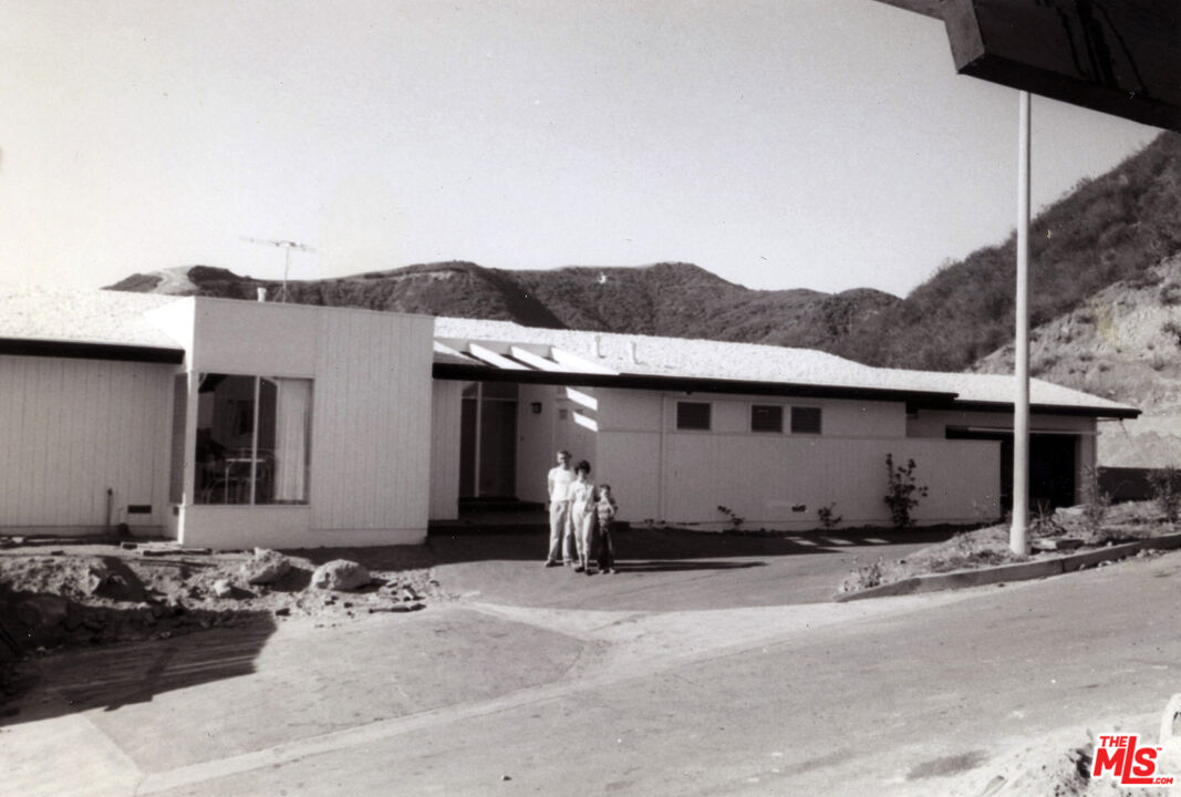 1373 Las Canoas Road Pacific Palisades, CA 90272 - Photo 2 of 19 a view of a house with a patio