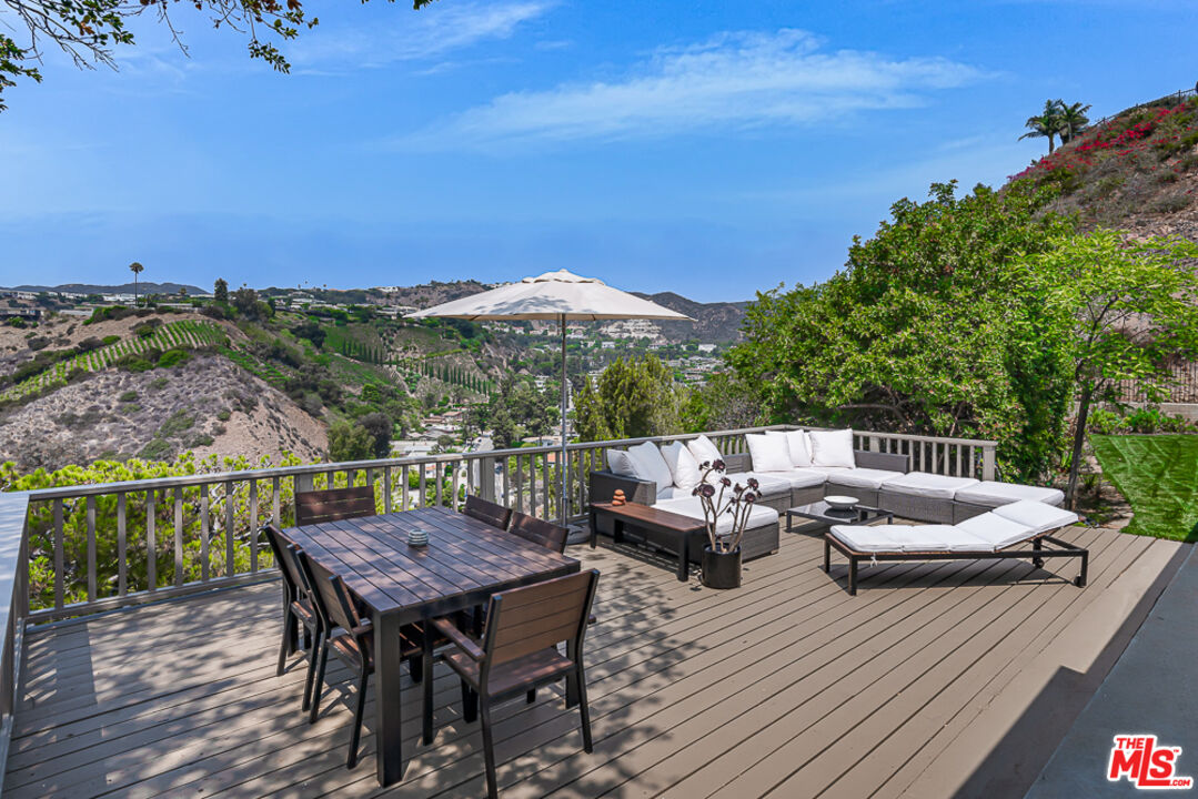 1373 Las Canoas Road Pacific Palisades, CA 90272 - Photo 3 of 19 an outdoor view with patio