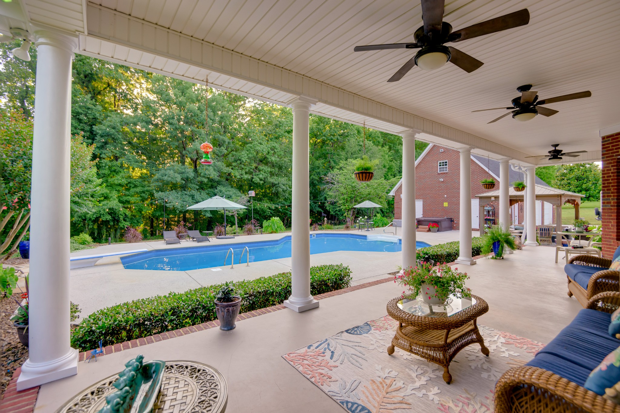 3079 Riley Creek Road Normandy, TN 37360 - Photo 12 of 59 a living room with patio furniture and a garden