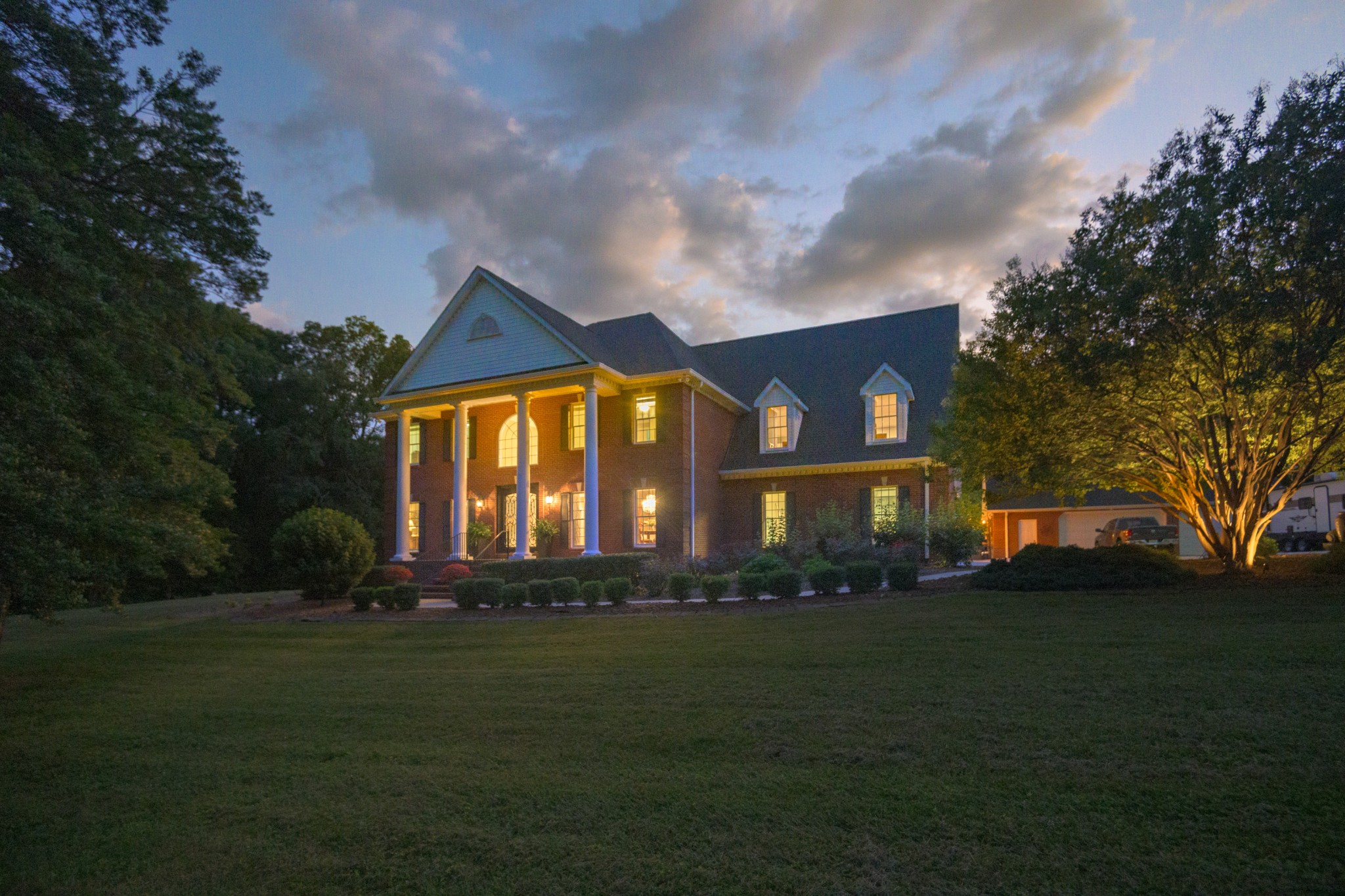 3079 Riley Creek Road Normandy, TN 37360 - Photo 2 of 59 a front view of a house with a garden