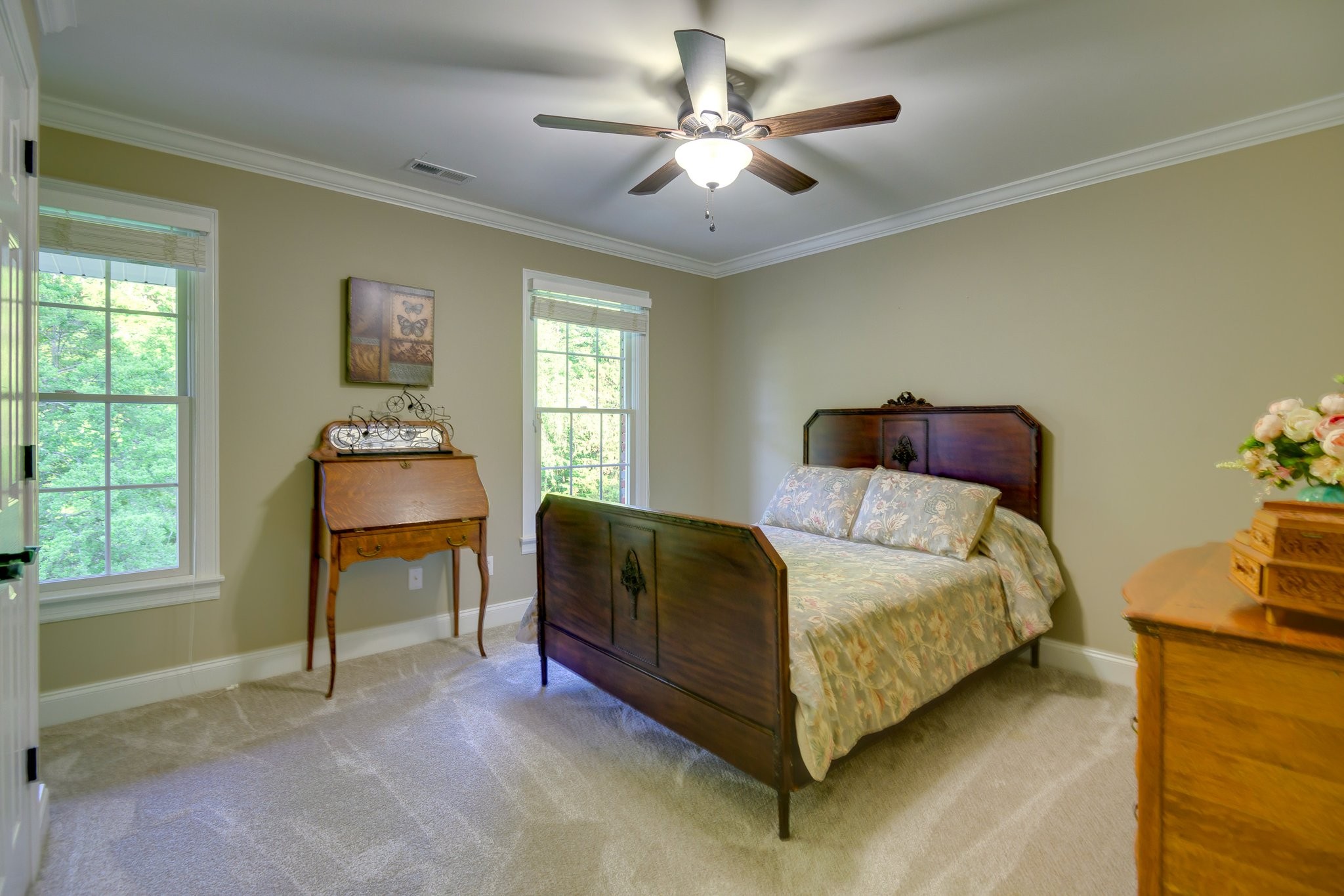 3079 Riley Creek Road Normandy, TN 37360 - Photo 57 of 59 a bedroom with a bed and a chandelier