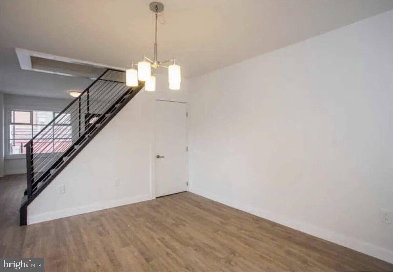 5 Coates Street Bridgeport, PA 19405 - Photo 7 of 28 a view of a room with wooden floor and white walls
