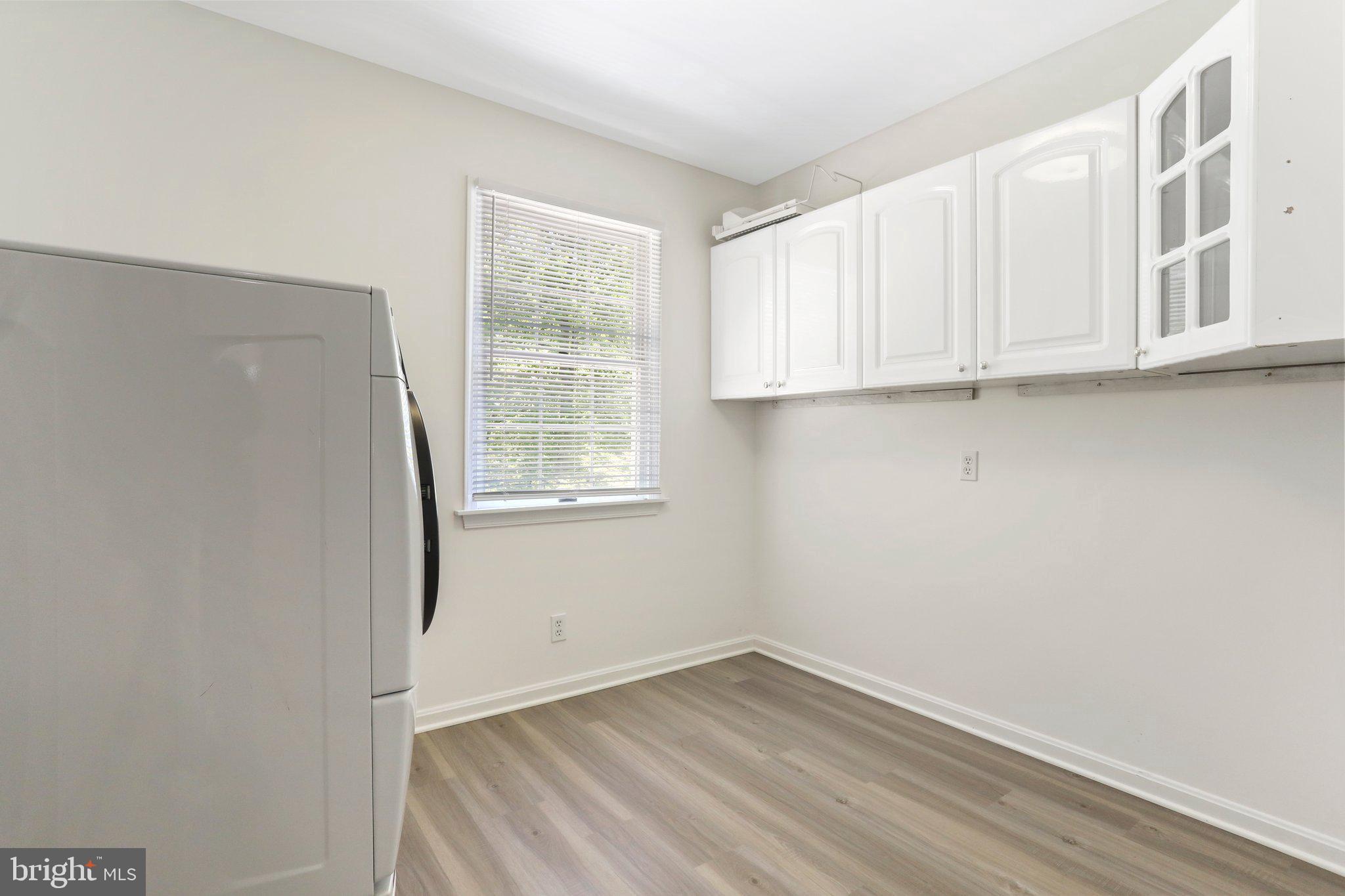 15120 Peach Orchard Road Silver Spring, MD 20905 - Photo 40 of 76 ENORMOUS UPPER LEVEL LAUNDRY ROOM W BUILT-INS!!