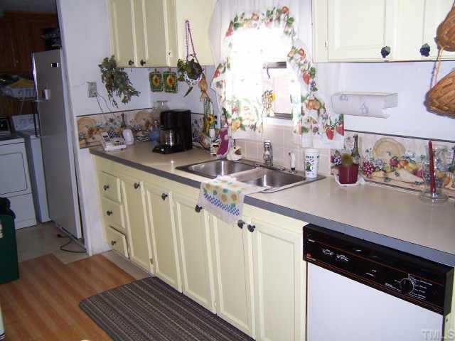 The kitchen has a wonderful view of the huge back yard. Other