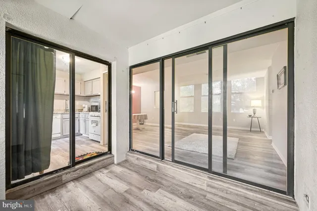 a view of an empty room and window