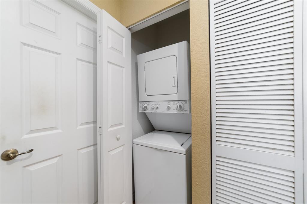 8915 Southwest 19th Street, Unit 8915 Miramar, FL 33025 - Photo 18 of 27 a utility room with dryer and washer