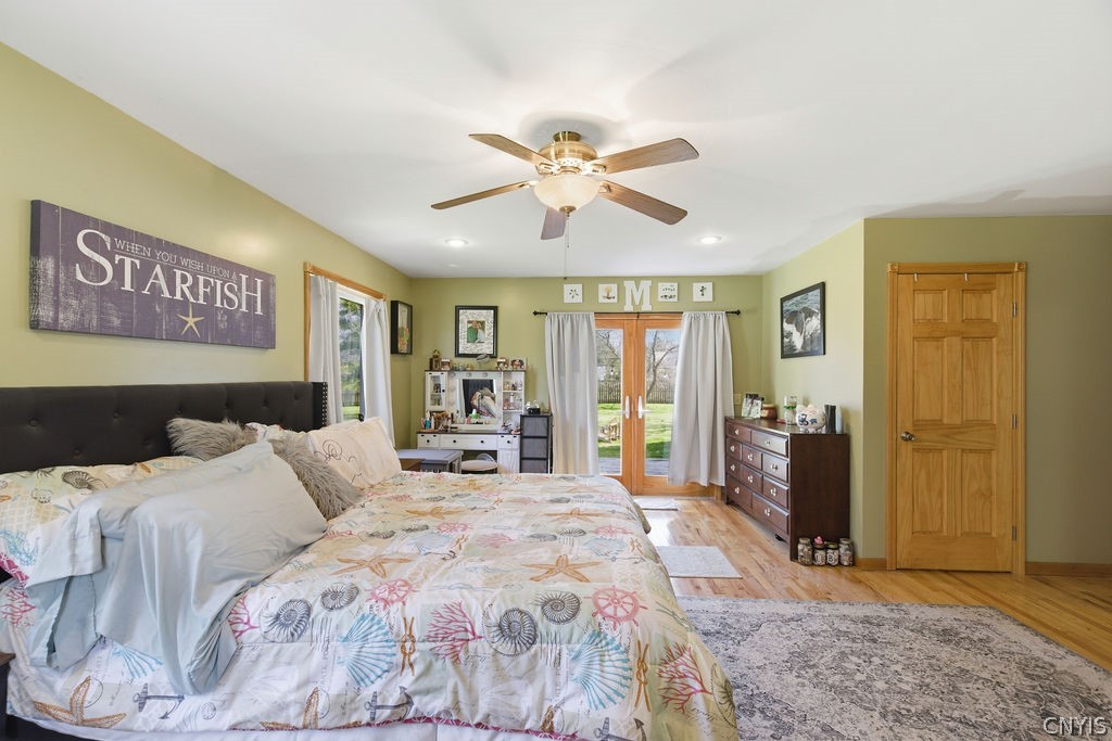 58 Madison Street Hamilton, NY 13346 - Photo 20 of 37 Primary bedroom suite, French doors to the deck at