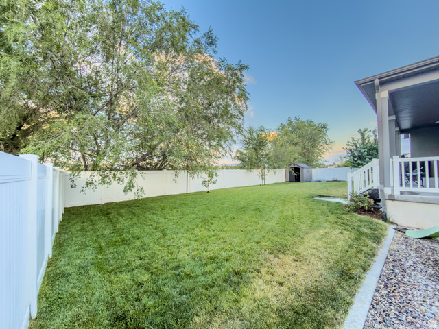 3269 West 650 North Layton, UT 84041 - Photo 31 of 35 Expansive lawn space bordered by privacy fencing