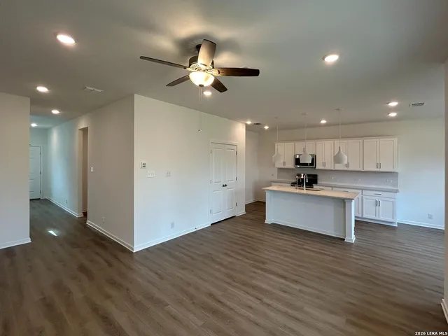 a view of kitchen with wooden floor