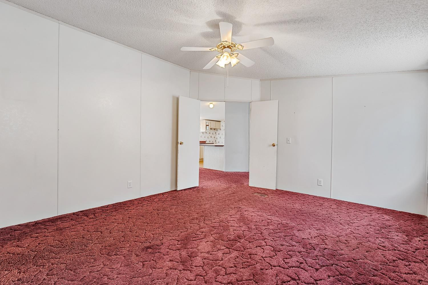 5501 County Road 1240 Lubbock, TX 79407 - Photo 13 of 22 a view of an empty room and chandelier fan