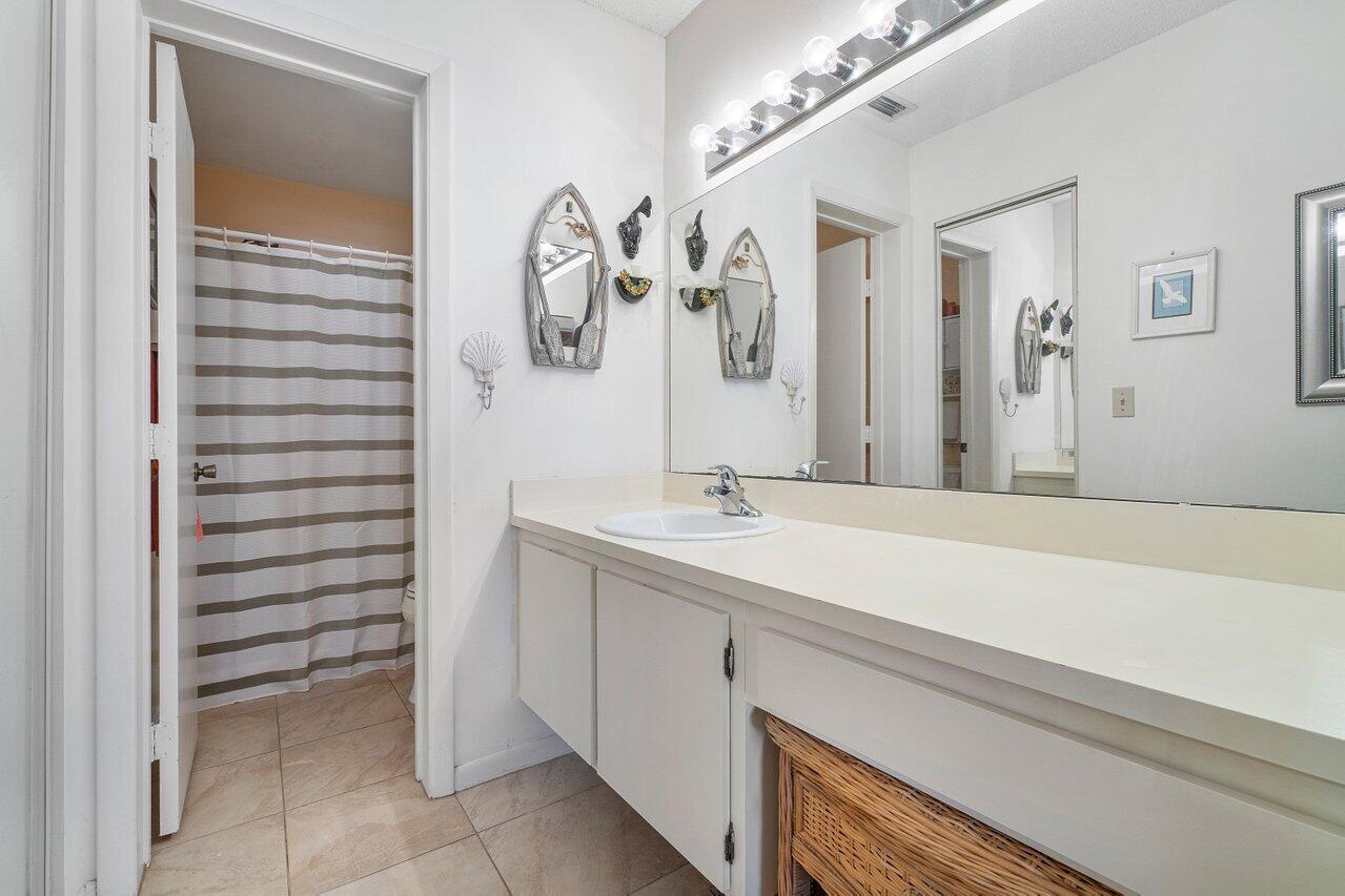 1402 Pinecrest Circle, Unit C Jupiter, FL 33458 - Photo 13 of 27 Master Bathroom