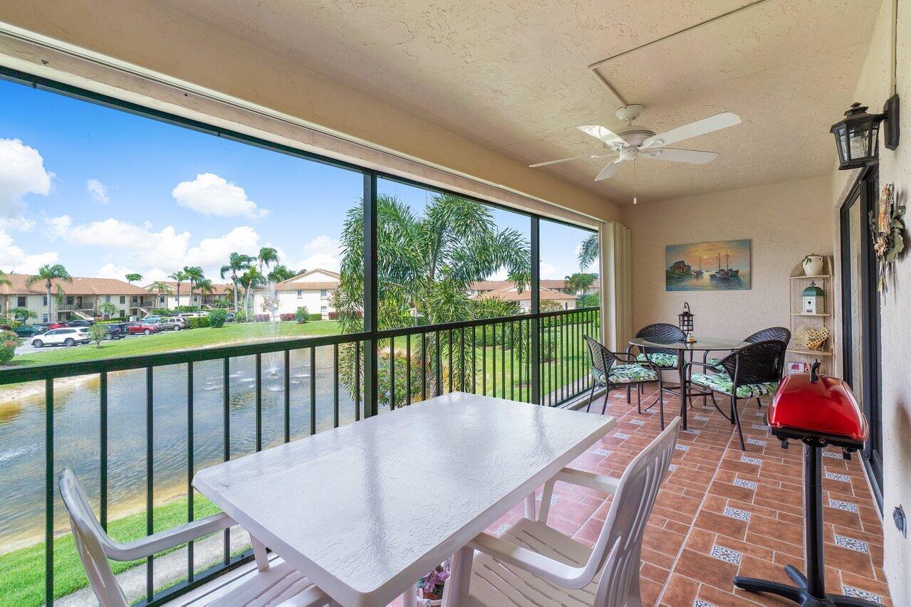 1402 Pinecrest Circle, Unit C Jupiter, FL 33458 - Photo 14 of 27 Pool view from Patio