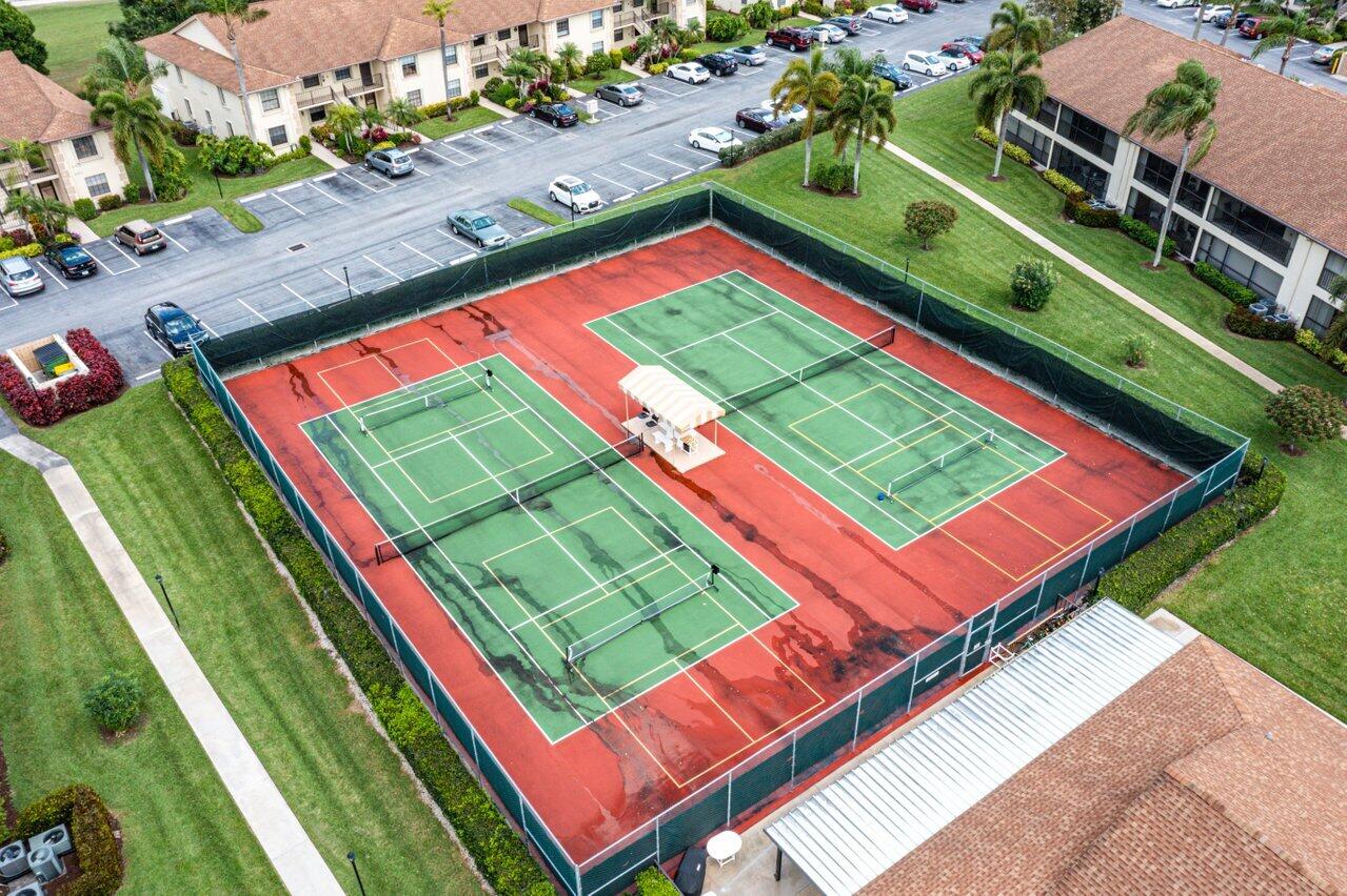 1402 Pinecrest Circle, Unit C Jupiter, FL 33458 - Photo 19 of 27 Pinecrest Pickle/Tennis Courts