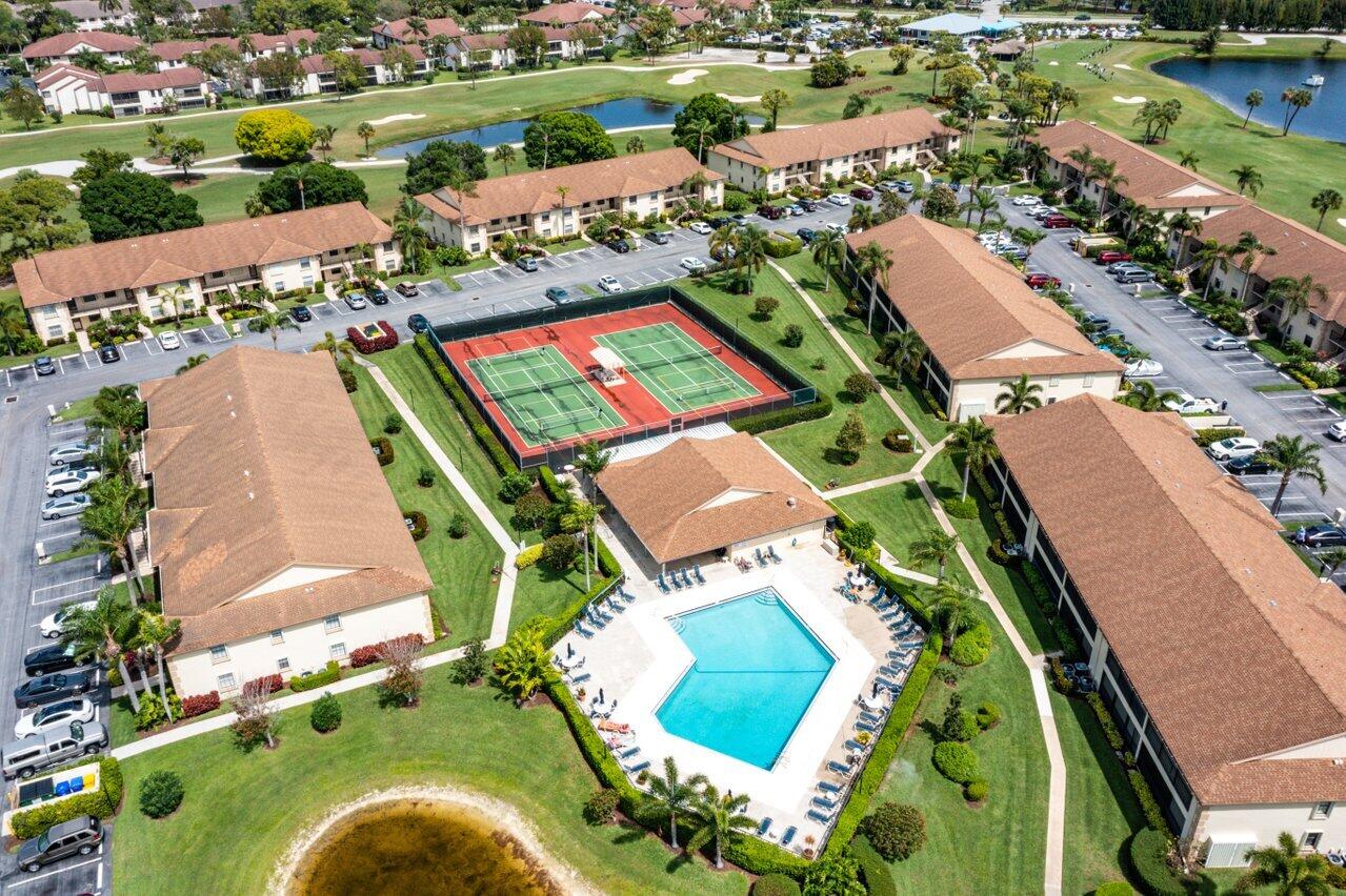 1402 Pinecrest Circle, Unit C Jupiter, FL 33458 - Photo 20 of 27 Pinecrest Pool & Pickle/Tennis Courts