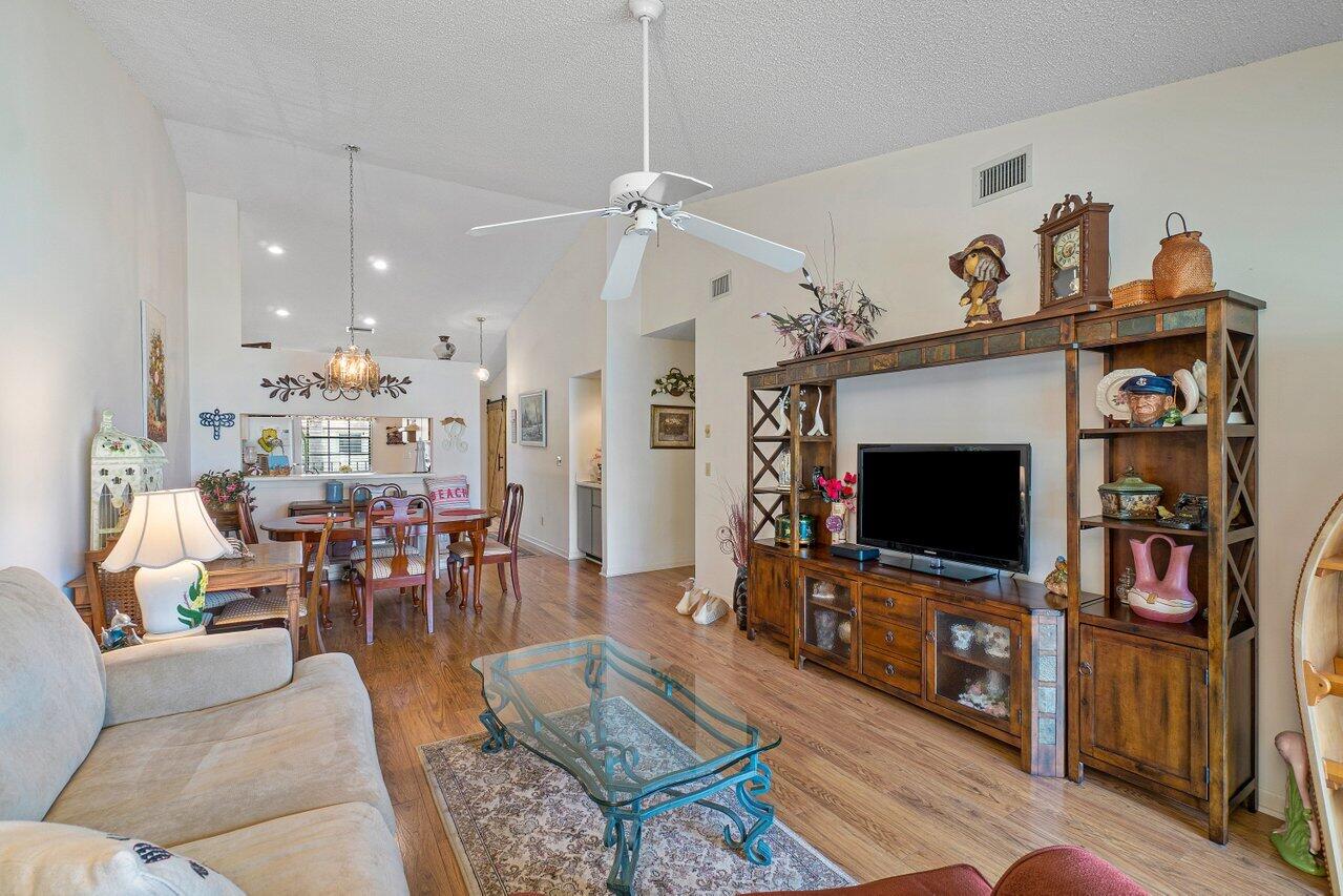 1402 Pinecrest Circle, Unit C Jupiter, FL 33458 - Photo 5 of 27 Living/Dining Area