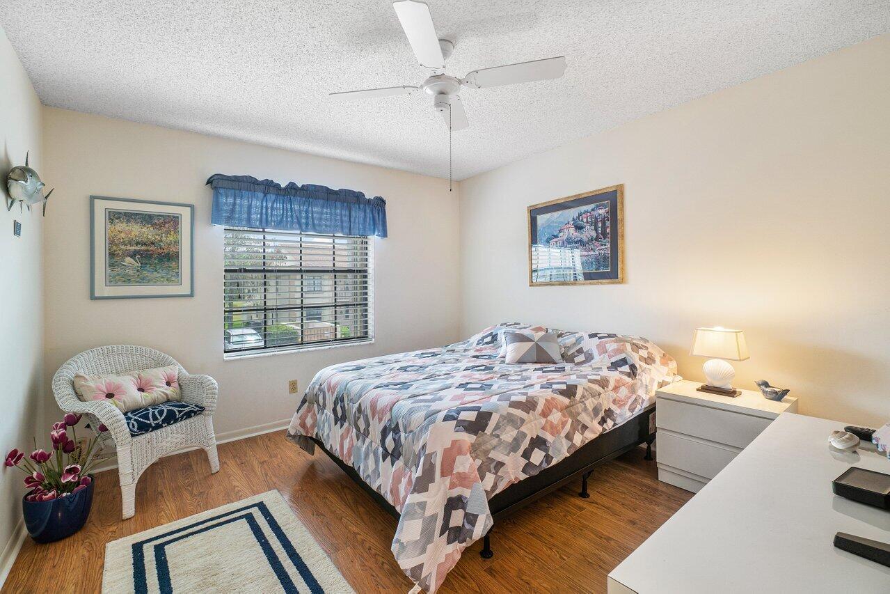 1402 Pinecrest Circle, Unit C Jupiter, FL 33458 - Photo 10 of 27 Guest Bedroom