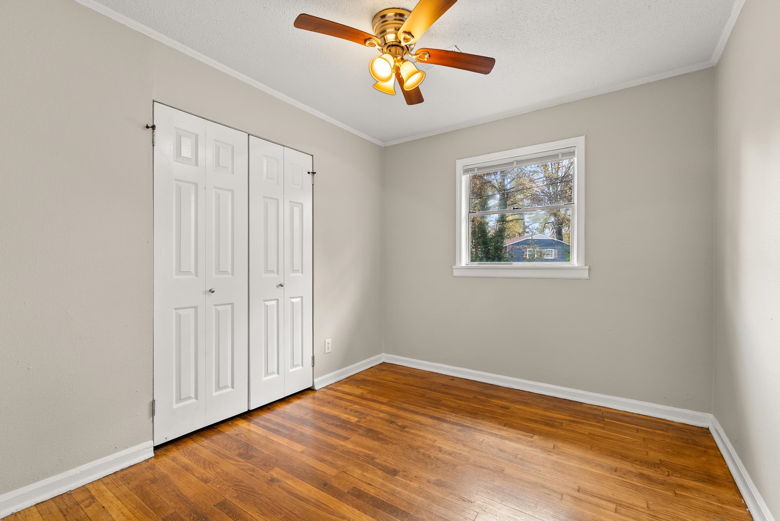 686 Delta Road Memphis, TN 38109 - Photo 13 of 24 a view of empty room with wooden floor