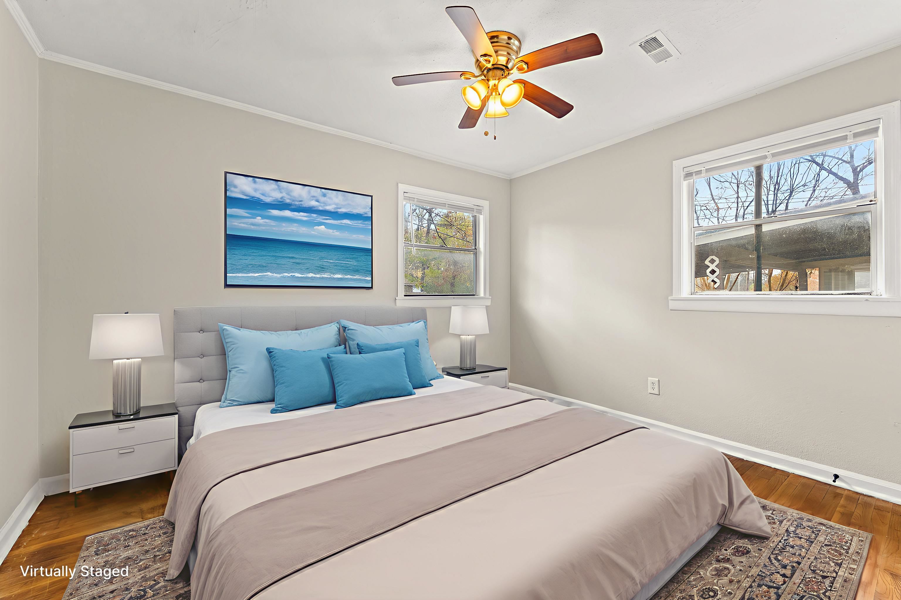 686 Delta Road Memphis, TN 38109 - Photo 16 of 24 a bedroom with a bed and a painting on the wall