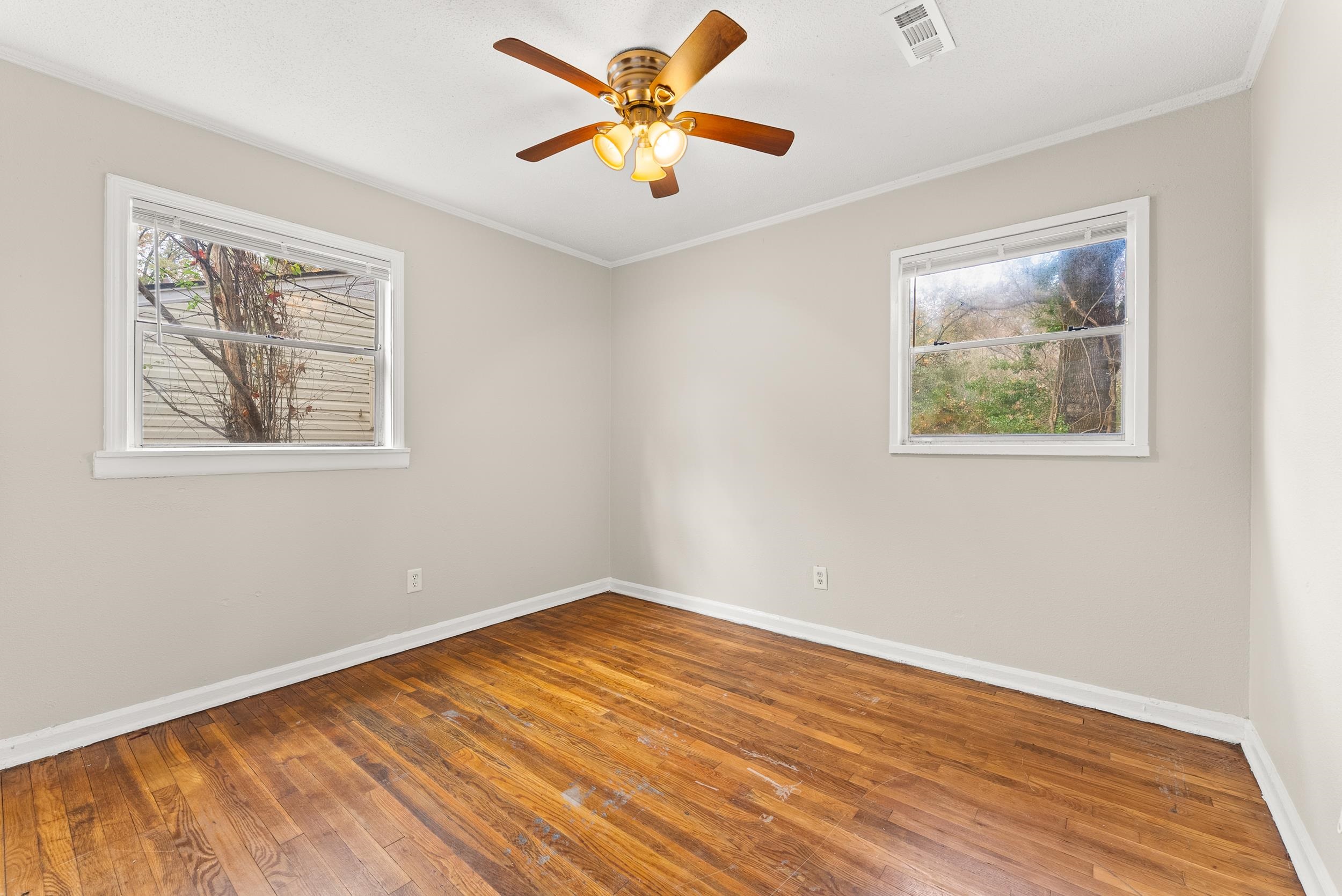686 Delta Road Memphis, TN 38109 - Photo 20 of 24 a view of empty room with wooden floor