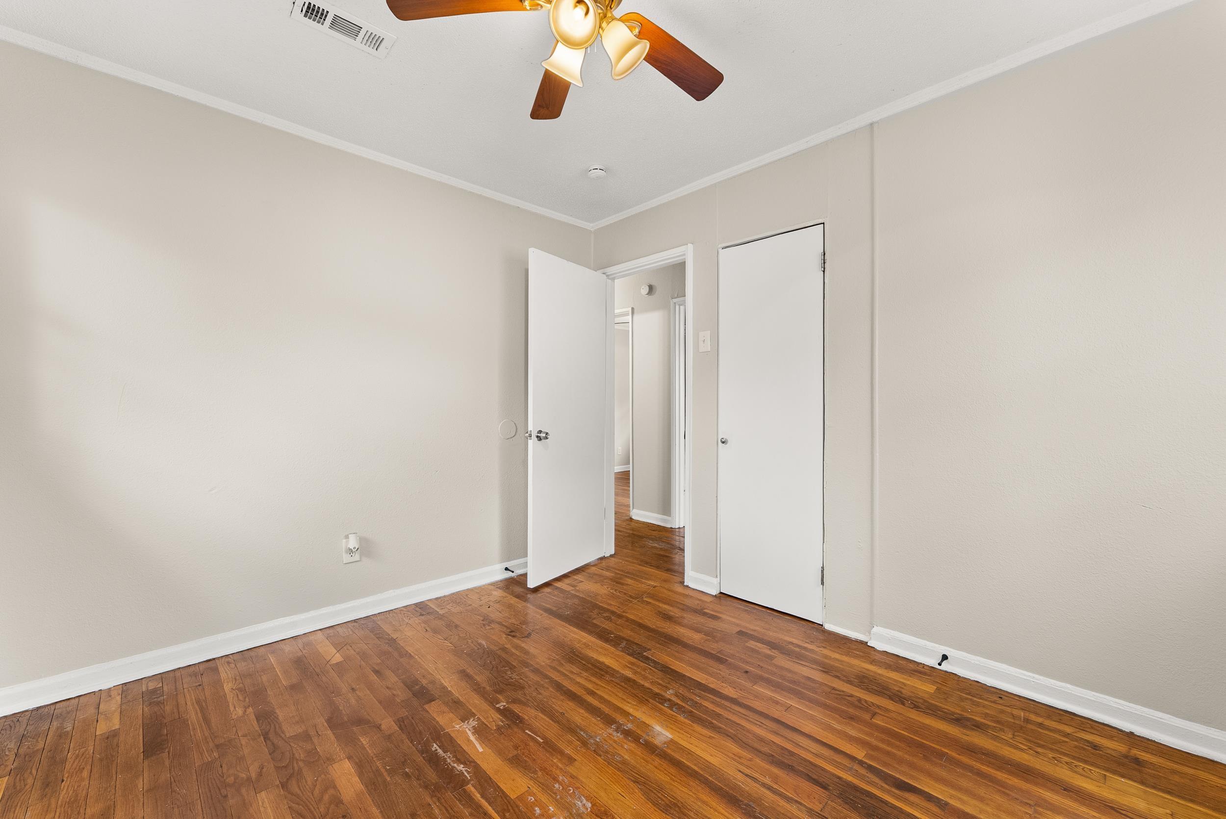 686 Delta Road Memphis, TN 38109 - Photo 21 of 24 wooden floor in an empty room