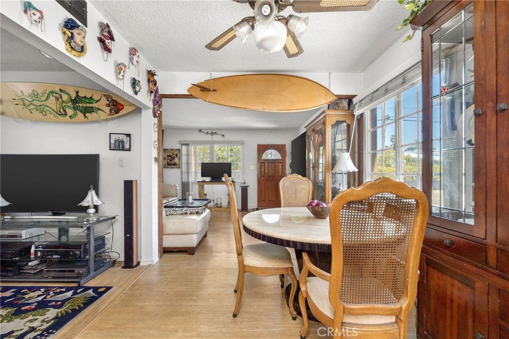 2905 Rindge Lane Redondo Beach, CA 90278 - Photo 23 of 26 a dining room with furniture and a flat screen tv