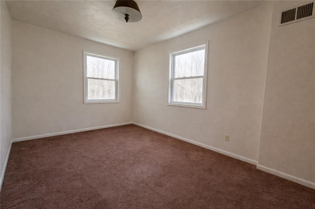 1515 Manhattan Street Pittsburgh, PA 15233 - Photo 17 of 46 an empty room with windows