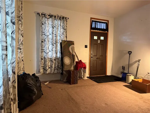 a bedroom with double bed and a closet