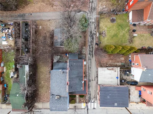 an aerial view of a city with lots of residential buildings