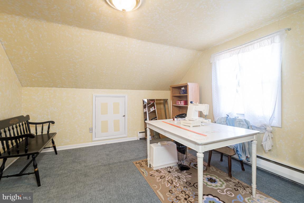 8504 Bassett Road Baltimore, MD 21237 - Photo 24 of 35 a view of a dining room with furniture and a table
