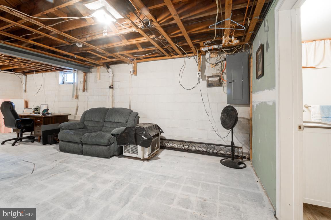 8504 Bassett Road Baltimore, MD 21237 - Photo 28 of 35 a living room with furniture