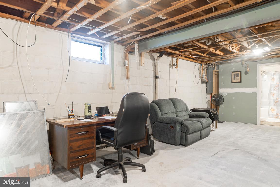 8504 Bassett Road Baltimore, MD 21237 - Photo 29 of 35 a work room with furniture