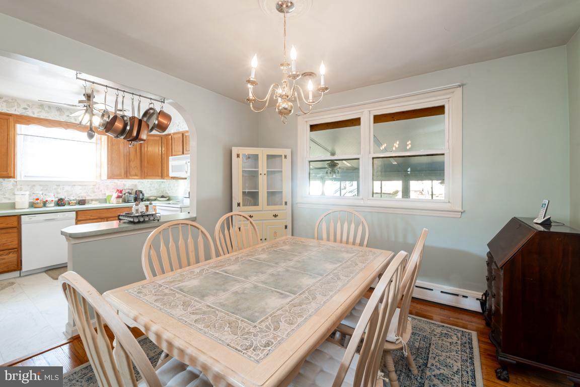 8504 Bassett Road Baltimore, MD 21237 - Photo 3 of 35 a view of a dining room with furniture window and outside view