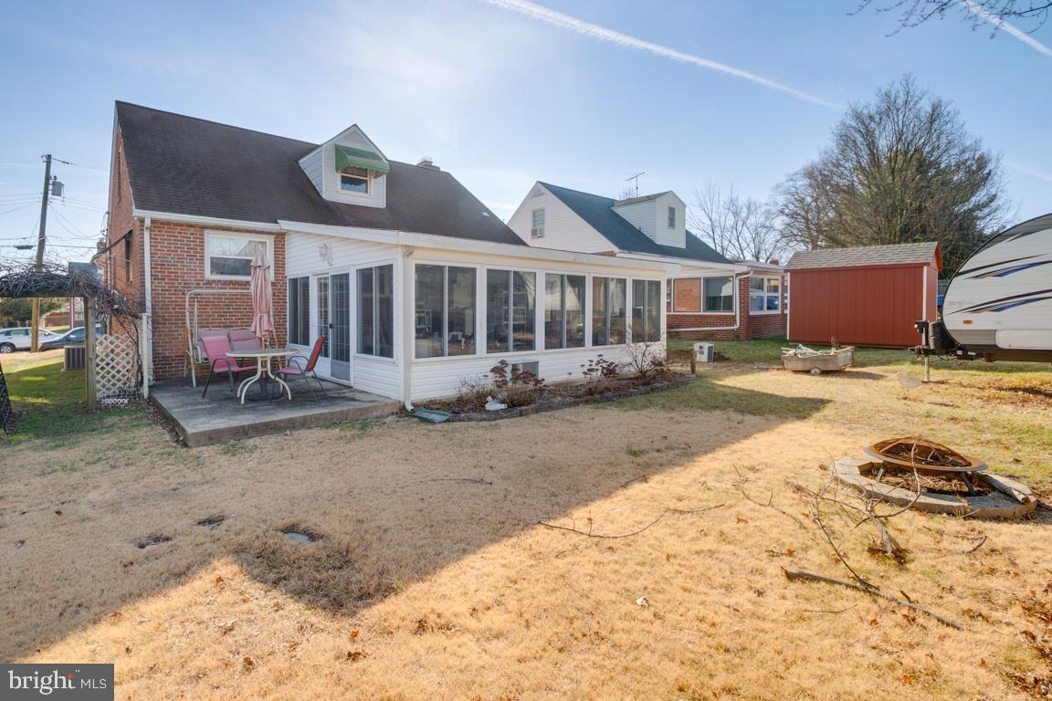 8504 Bassett Road Baltimore, MD 21237 - Photo 34 of 35 a view of a house with backyard and sitting area