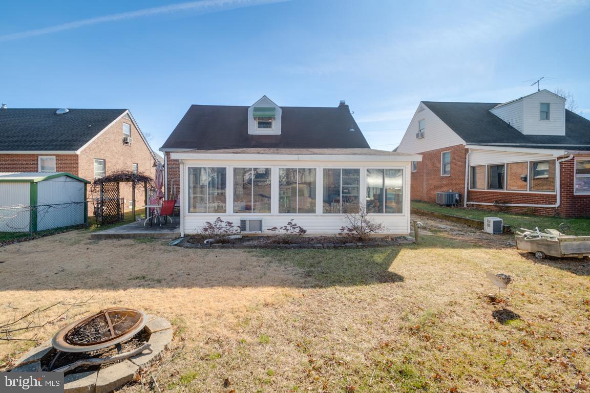 8504 Bassett Road Baltimore, MD 21237 - Photo 35 of 35 a front view of a house with a yard