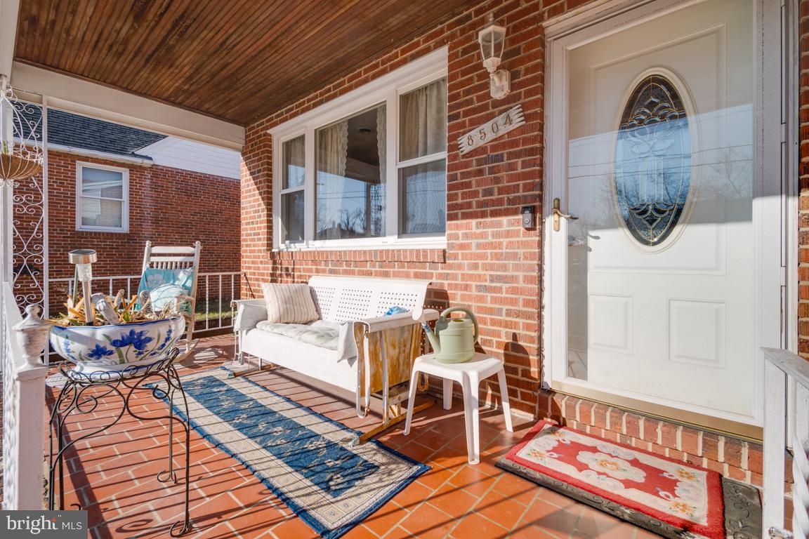 8504 Bassett Road Baltimore, MD 21237 - Photo 5 of 35 a view of a chairs in a patio