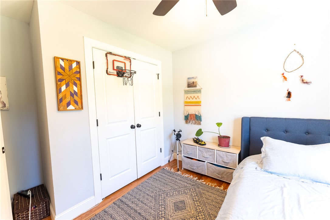 696 Mt Olivet Road Six Mile, SC 29682 - Photo 17 of 35 This cozy bedroom features warm wood floors and ample natural light.
