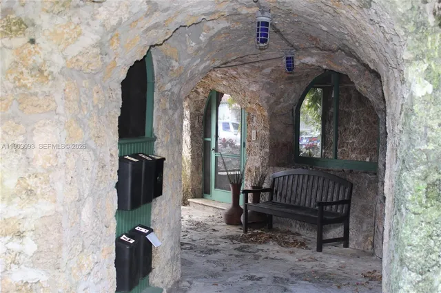 a view of outdoor sitting area with fire pit