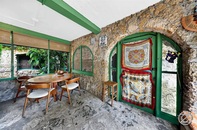 a living room with furniture and a couch