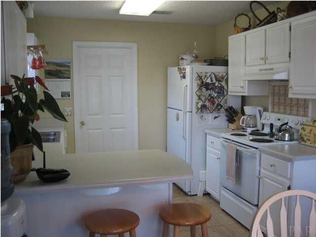 5861 Admirals Road Milton, FL 32583 - Photo 5 of 24 Another view of kitchen. Stove area is plumbed for gas.