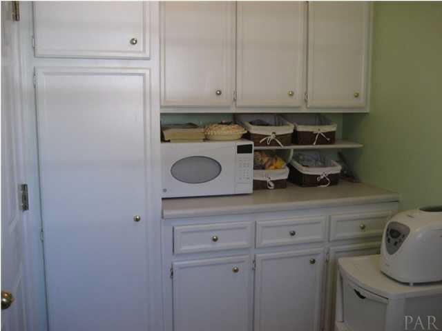 5861 Admirals Road Milton, FL 32583 - Photo 8 of 24 Laundry room built in storage.