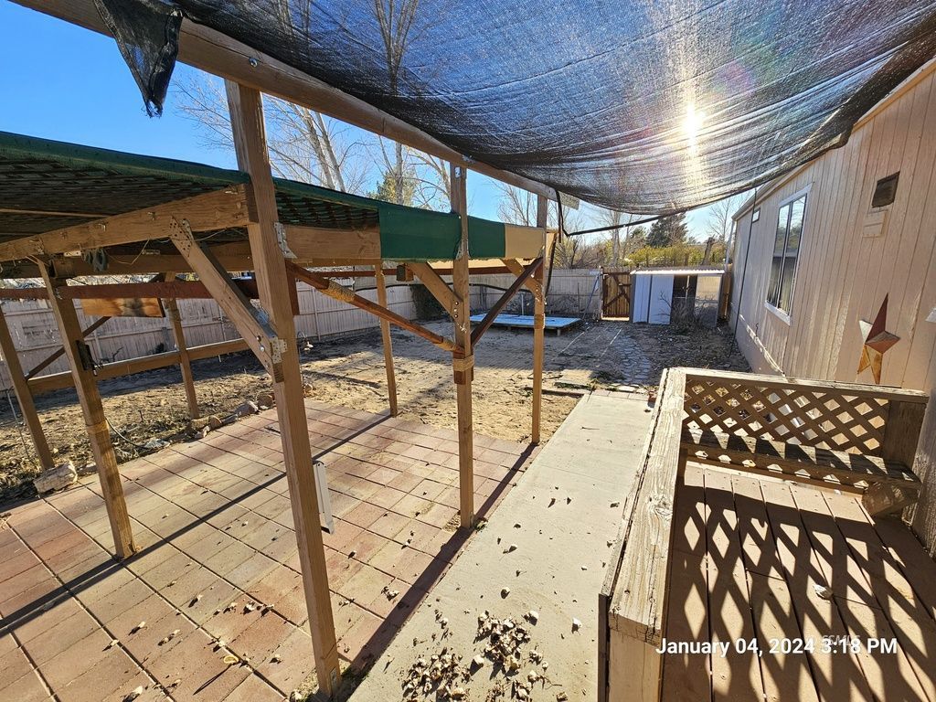 1330 North Pluto Street Ridgecrest, CA 93555 - Photo 20 of 32 a patio with table and chairs