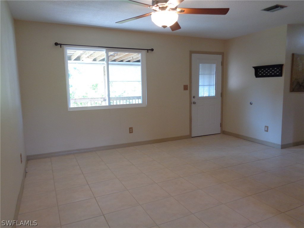 5458 Judith Road Bokeelia, FL 33922 - Photo 13 of 25 a view of a livingroom with a window