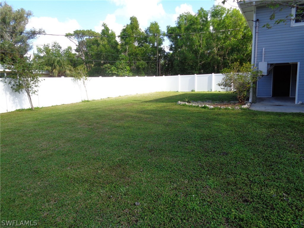 5458 Judith Road Bokeelia, FL 33922 - Photo 17 of 25 a view of a backyard