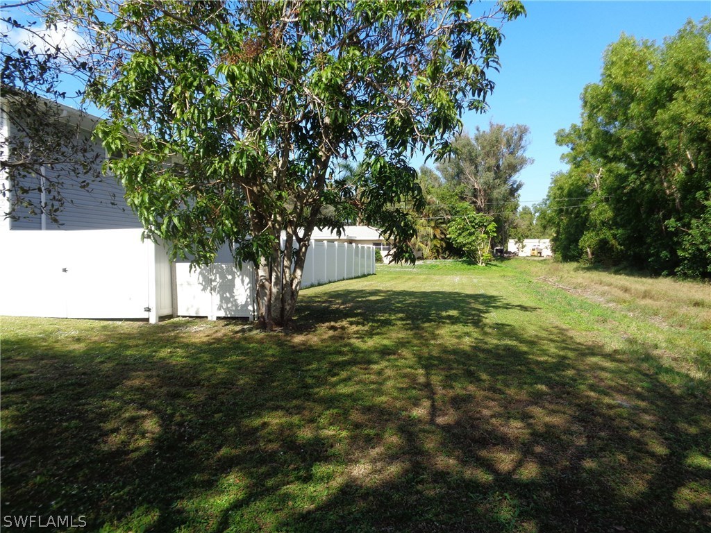 5458 Judith Road Bokeelia, FL 33922 - Photo 19 of 25 a view of a field with a tree